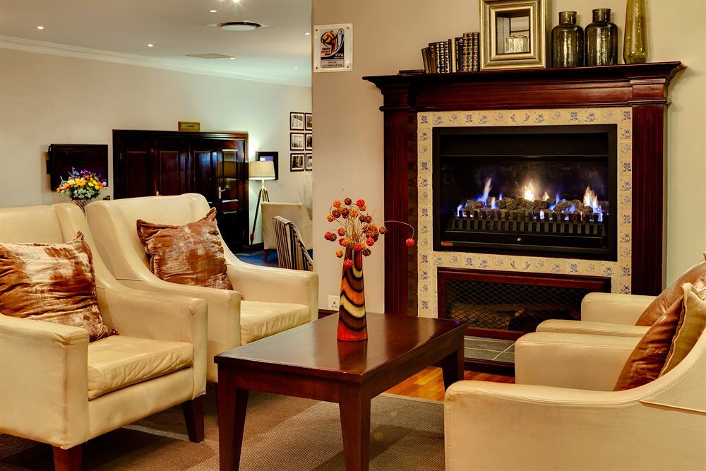 Irene Country Lodge, Autograph Collection Centurion Exterior foto A fireplace in a home